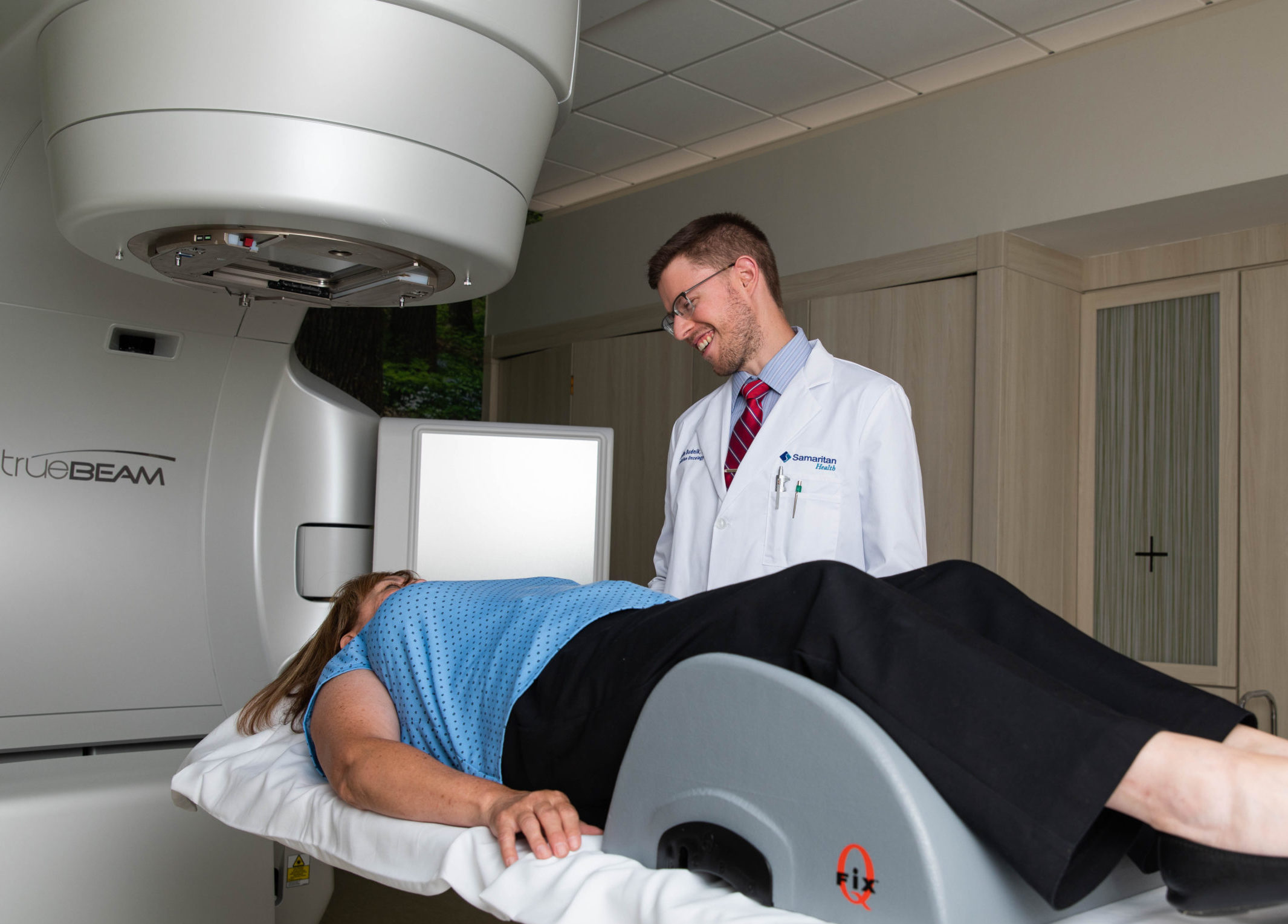 Doctor observes a patient under Interventional Radiology treatment