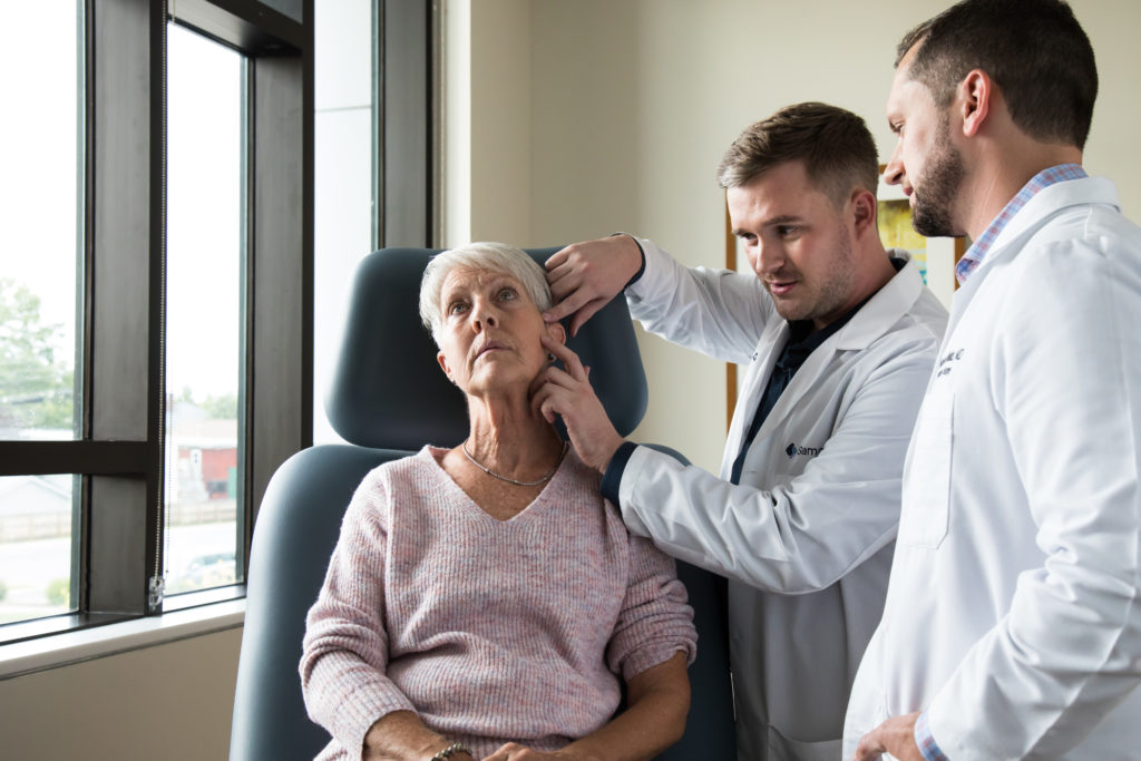 Patient with dermatologists