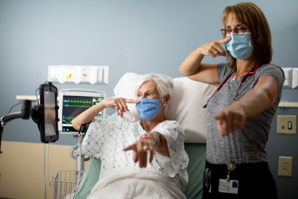 Doctor provides stroke test. 