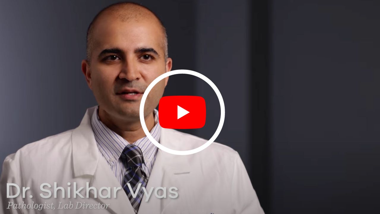 YouTube thumbnail to Dr. Shikhar Vyas, Pathologist, caregiver testimonial. Click to watch.