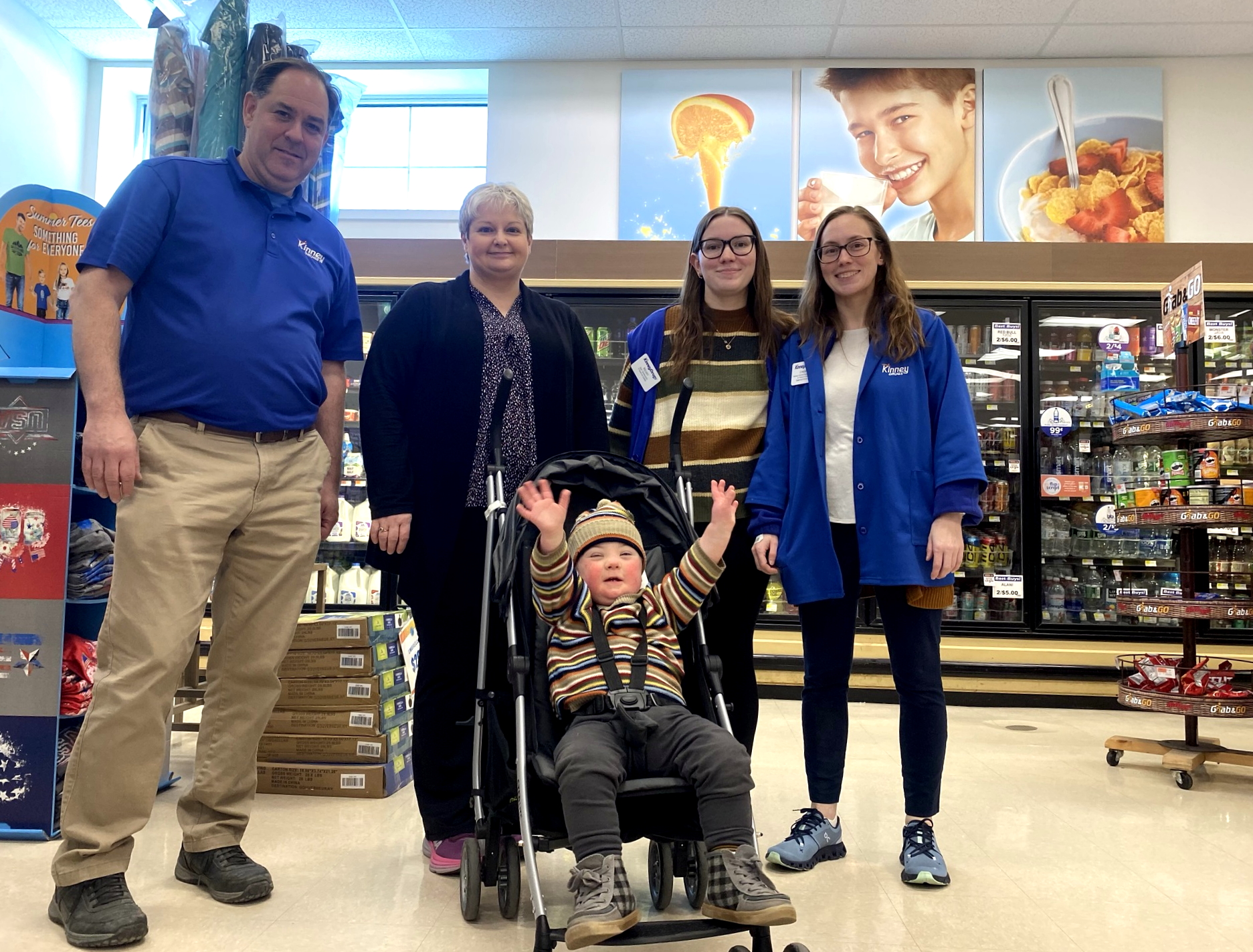 CMN of Northern NY Viggo Pecori with Kinney's staff during the CMN and Kinneys fundraiser campaign kickoff