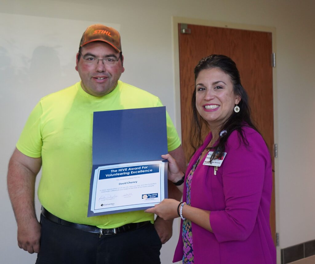 Pictured here, David Cheney was surprised with the HIVE Award on June 24 by Volunteer Services Manager Kristan Donoghue.