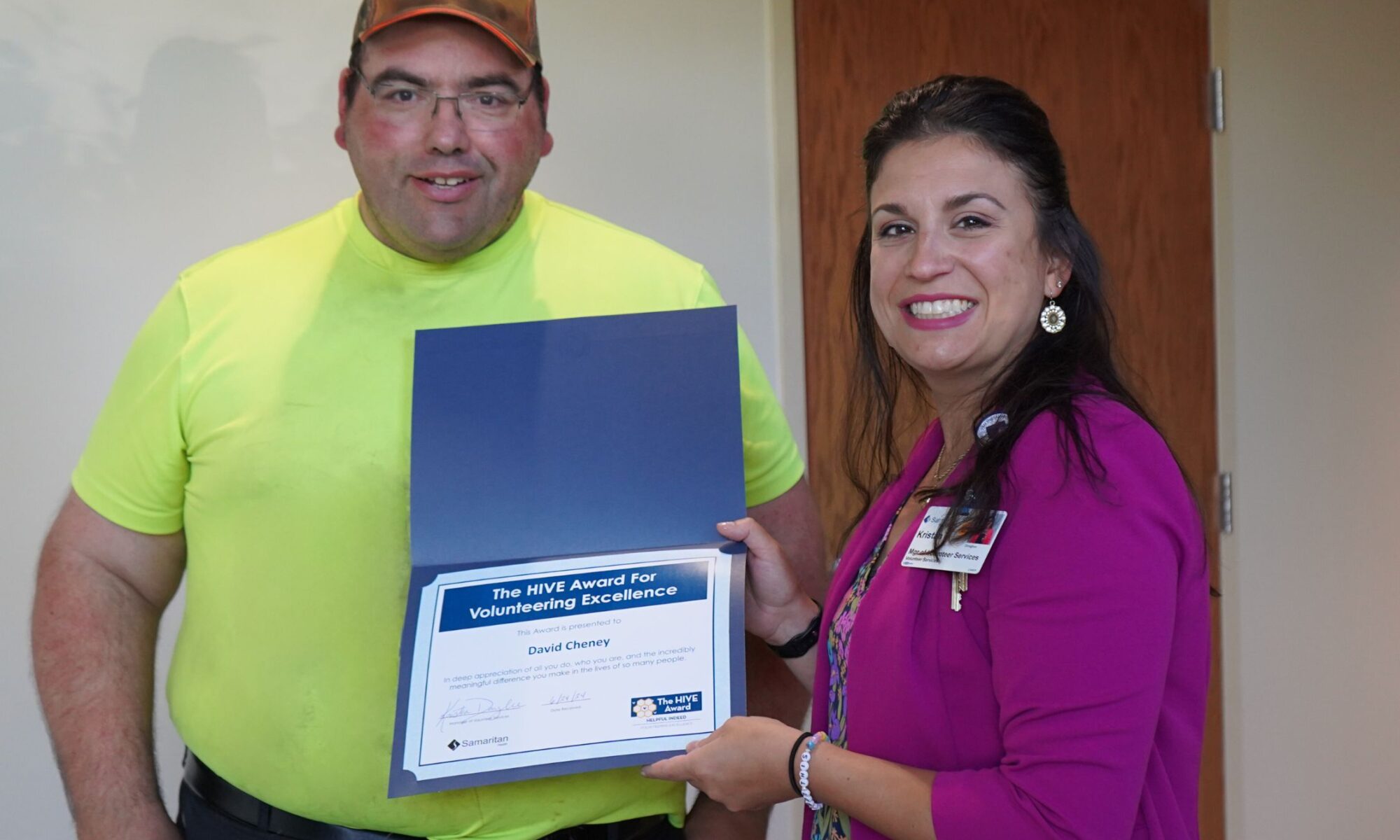 Pictured here, David Cheney was surprised with the HIVE Award on June 24 by Volunteer Services Manager Kristan Donoghue.