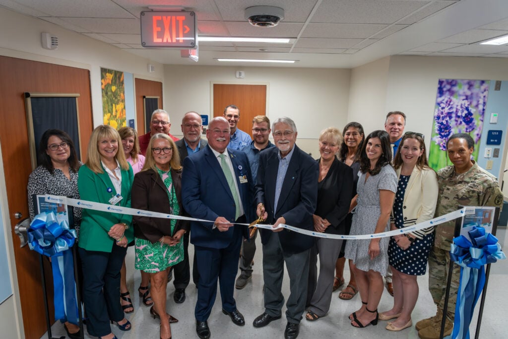 Visual of Samaritan Board members and community members during BHU ribbon cutting ceremony