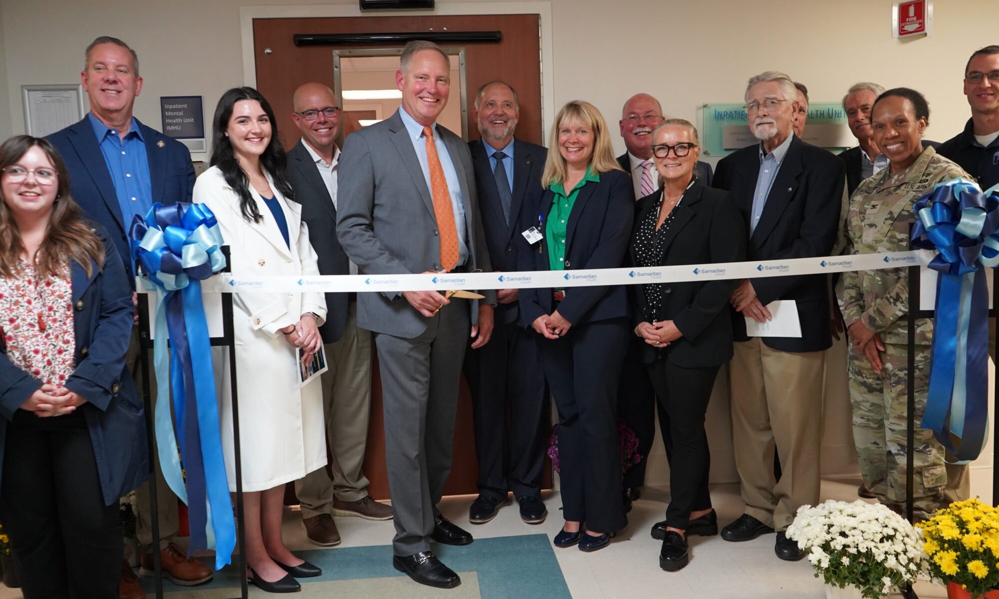 Ribbon cutting portrait from Samaritan's Inpatient Mental Health Unit new rooms. The picture shows Samaritan and community leaders.