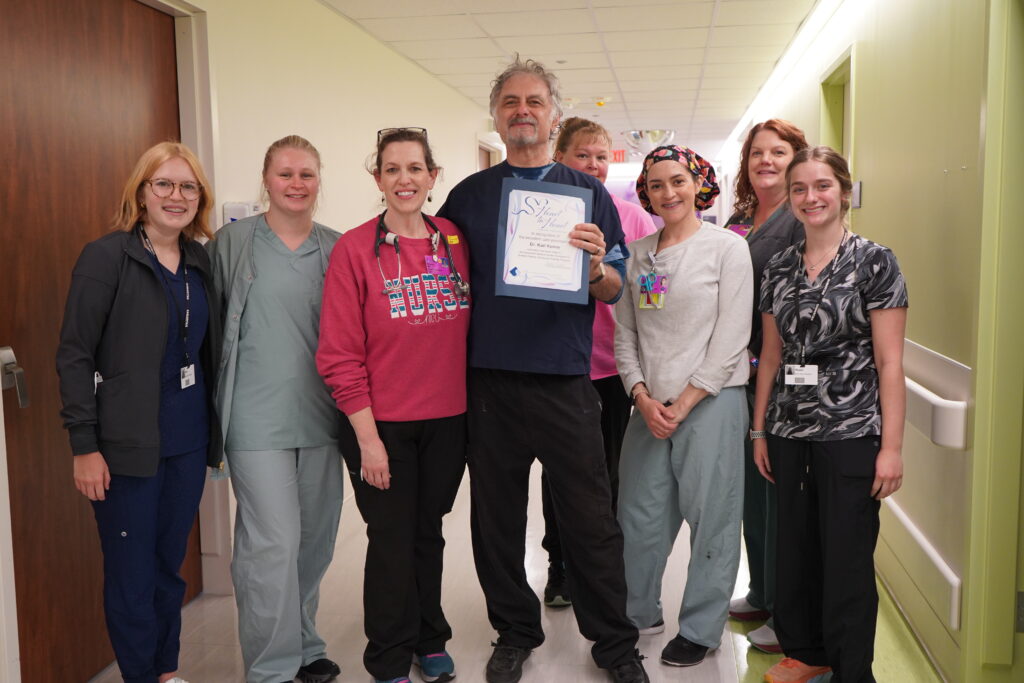 Dr. Karl Komar, from Samaritan's NICU, and the unit staff. He was the recipient of a Heart to Heart Grateful Patient recognition.