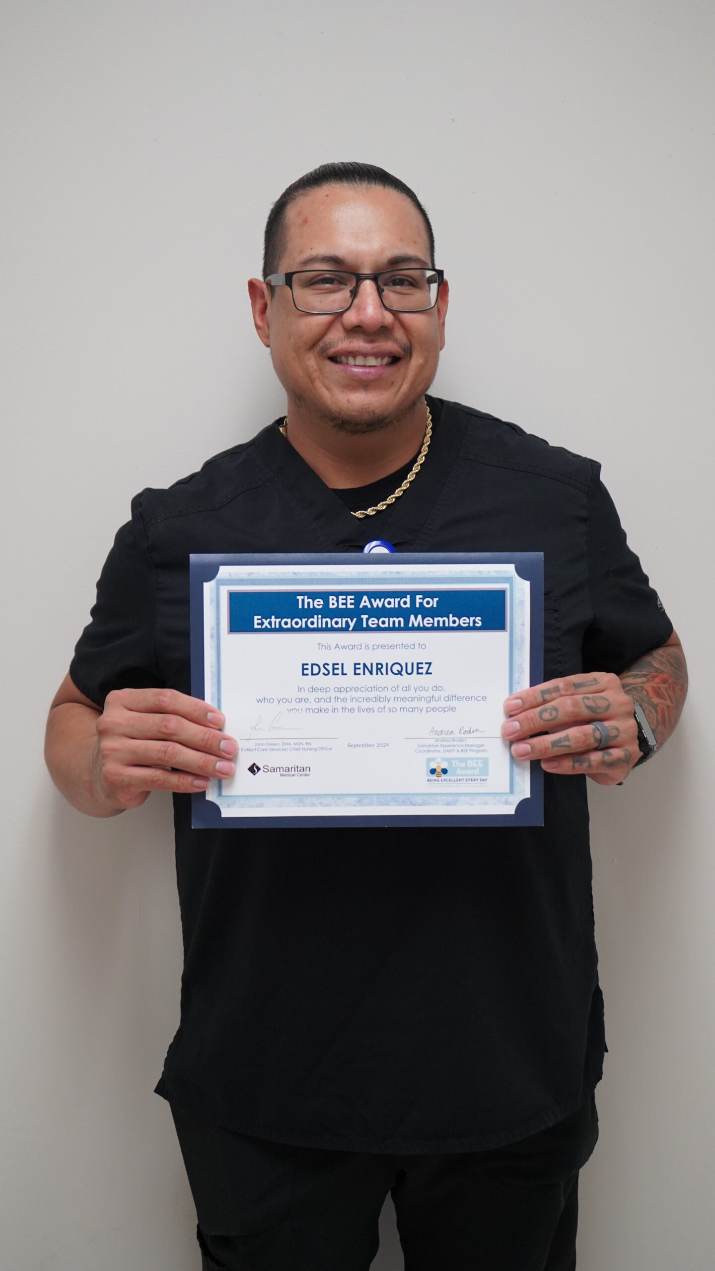 BEE Award winner for September 2024, Edsel Enriquez, nursing assistant at Samaritan Medical Center.