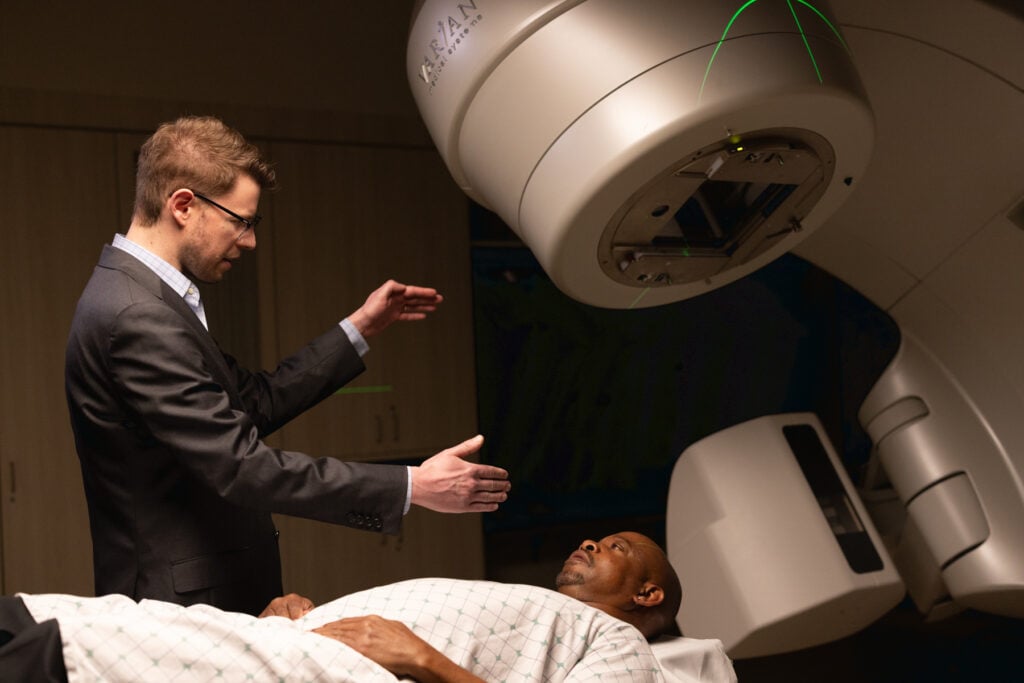 Photo of an imaging patient getting a scan with Dr. Budnik