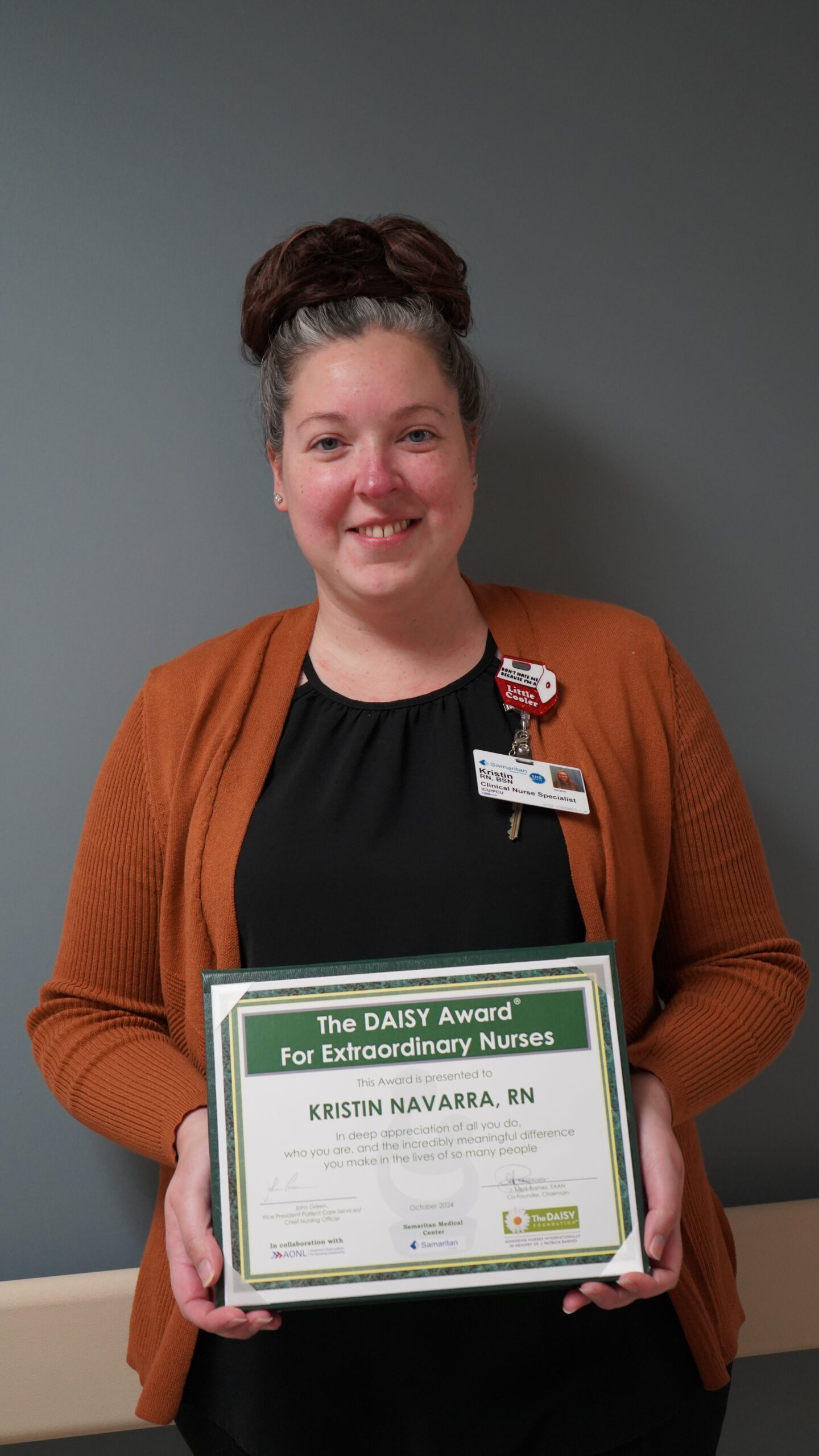 Portrait of Kirstan Navarra, RN. Daisy Award Winner for October 2024.