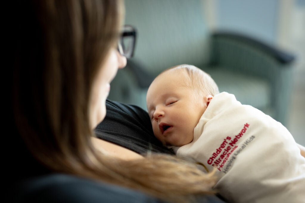 Photo of a mother and baby at the Car-Freshner Center for Women and Children