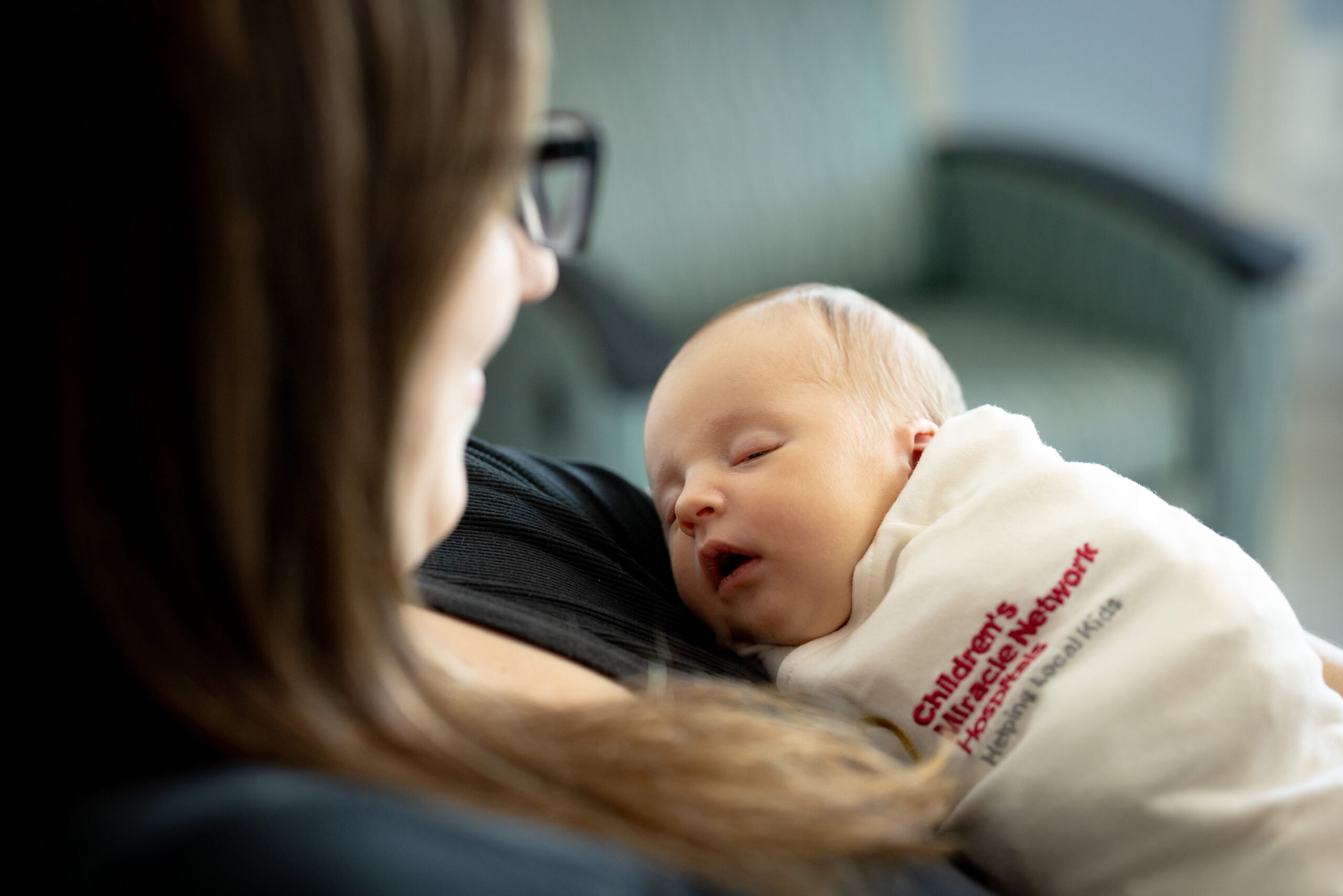 Photo of a mother and baby at the Car-Freshner Center for Women and Children