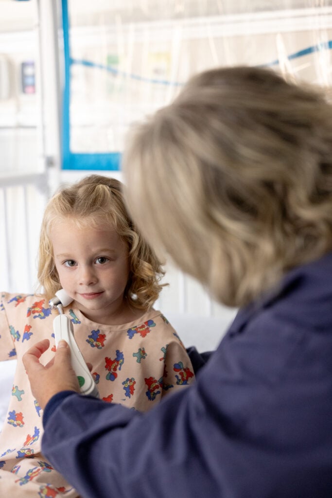 Photo of a pediatric patient in the Pediatric Ward at the Car-Freshner Center for Women and Children