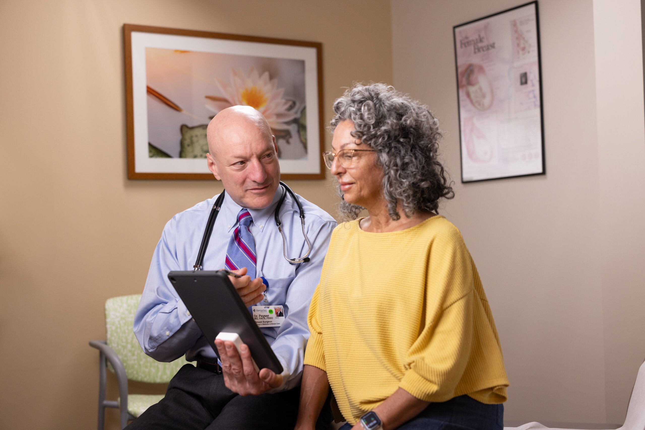 Photo of Dr. Peyser with a patient at Women's Wellness and Breast Care