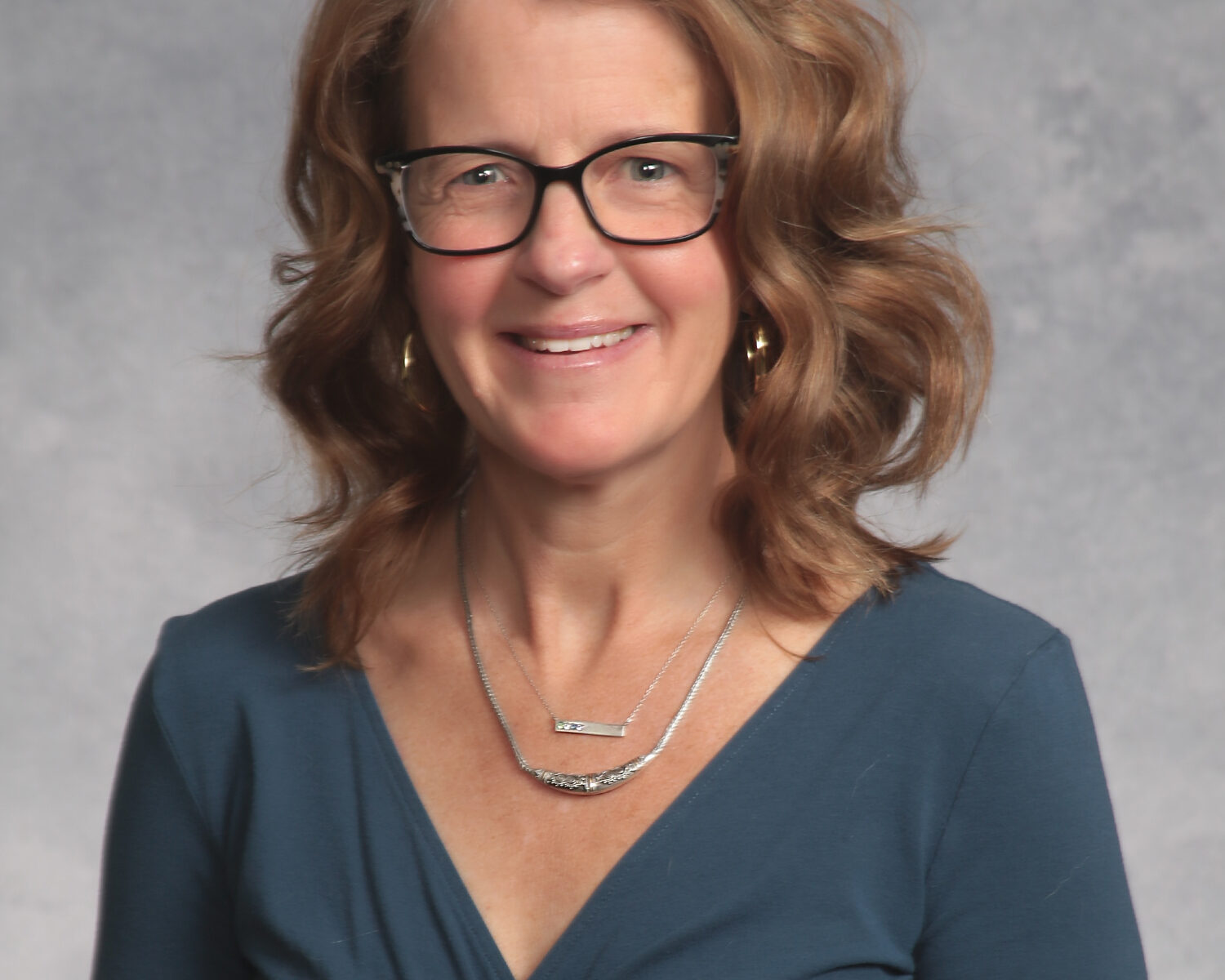 Professional Headshot of Dr. Sarah Delaney-Rowland
