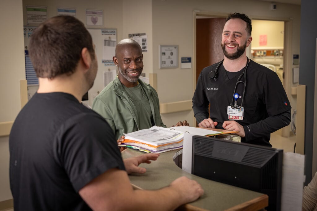 Three male nurses meet