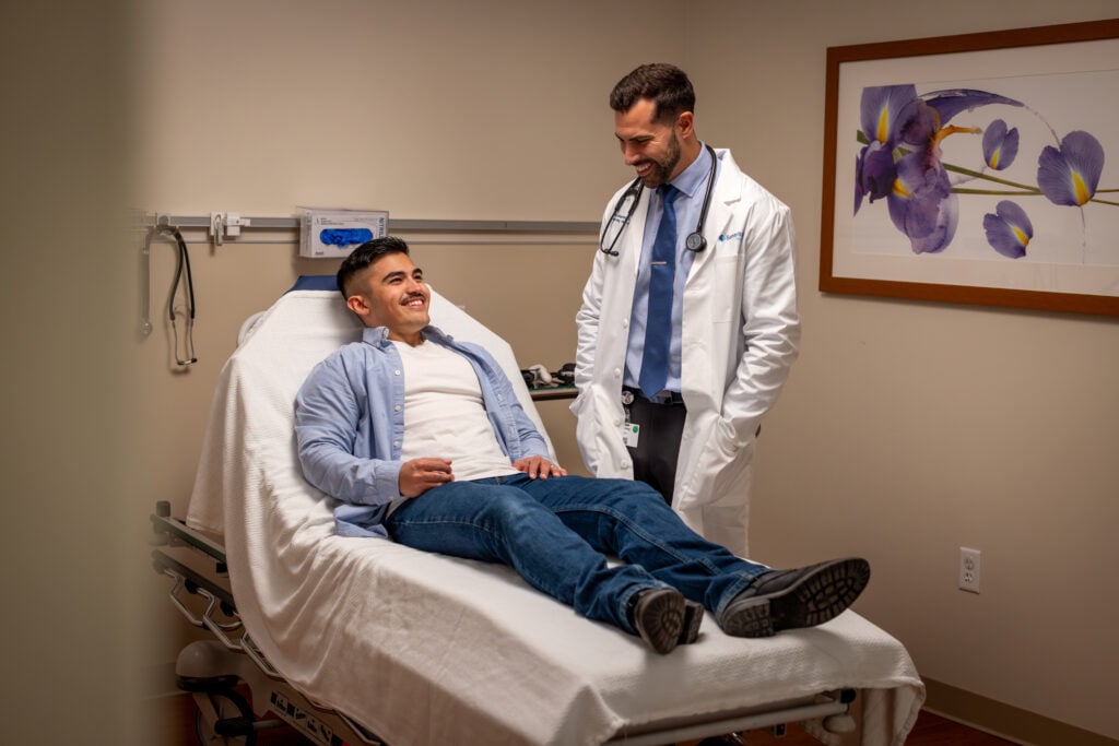 Dr. Jaeggi examines a patient at the Plaza