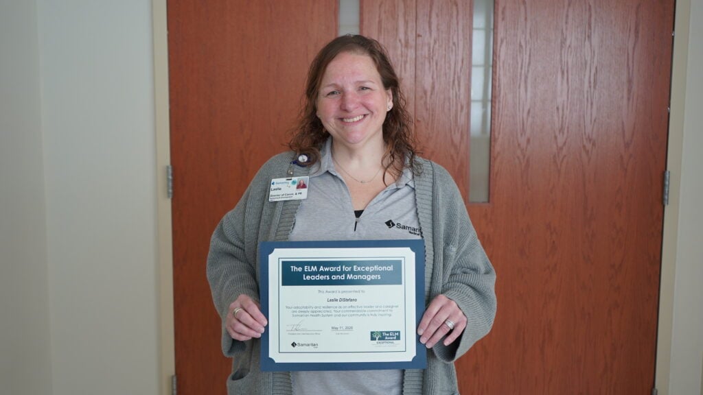 Photo of Leslie DiStefano, Samaritan's director of communication and public relations, posing with her ELM Award