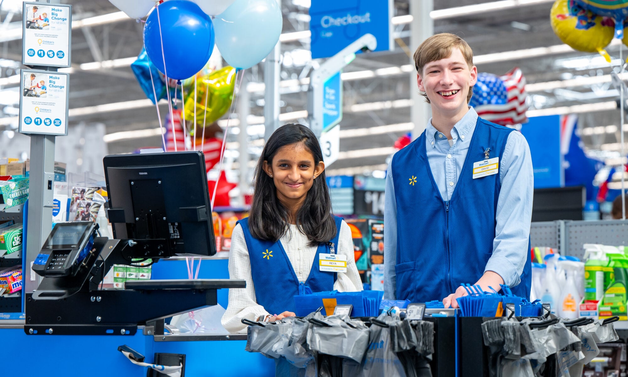 photo of Walmart employees with Children's Miracle Network balloons